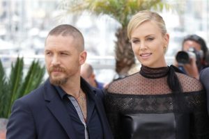 Tom Hardy and Charlize Theron pose for photographers during a photo call for the film Mad Max : Fury Road, at the 68th international film festival, Cannes, southern France, Thursday, May 14, 2015. (Photo by Joel Ryan/Invision/AP)