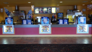 Cocoaplex’s concession stand awaits customers.  (Photo Courtesy of cocoaplexcinema.net)