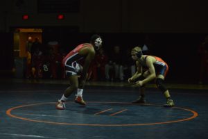Junior Alan Spicer circles Susquehanna's Michael Perry during the 145lb match.  Spicer fell on a 5-3  decision.  