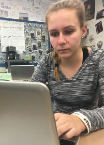 Madison Held works on her lit analysis on March 10, 2015. In Held’s English class, she is able to stay motivated people of her positive relationship with her teacher. 