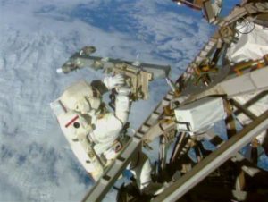 In this Sunday, March 1, 2015 image made from video provided by NASA, astronaut, Terry Virts, installs an antenna and boom during a spacewalk outside the International Space Station. On Friday, Feb. 19, 2016, NASA announced it received a record number of applicants _ some 18,300 _ for its next astronaut class. That’s more than double the previous record of 8,000 for the first space shuttle astronaut class in 1978. (AP Photo/NASA-TV) 