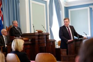 Iceland's Prime Minister Sigmundur David Gunnlaugsson, right, gives a statement at the Parliament regarding the Panama papers released yesterday, in Reykjavik on Monday April 4, 2016. Iceland's prime minister insisted Monday he would not resign after documents leaked in a media investigation allegedly link him to an offshore company that could represent a serious conflict of interest, according to information leaked from a Panamanian law firm at the center of an international tax evasion scheme. (AP Photo/Brynjar Gunnarsson)