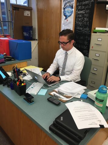 Boggess (above) types on his computer on September 6, 2016 at HHS. Before that, he prepared to give a test to his Honors English 10 class. (Broadcaster/Lydia Gould)