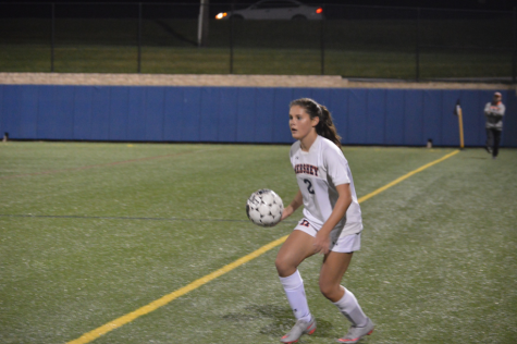 During the girl’s varsity soccer game sophomore, Maggie Gleason is getting ready to pass the ball back in. She took a step forward and went for it. (Broadcaster/Azelin Thompson)
