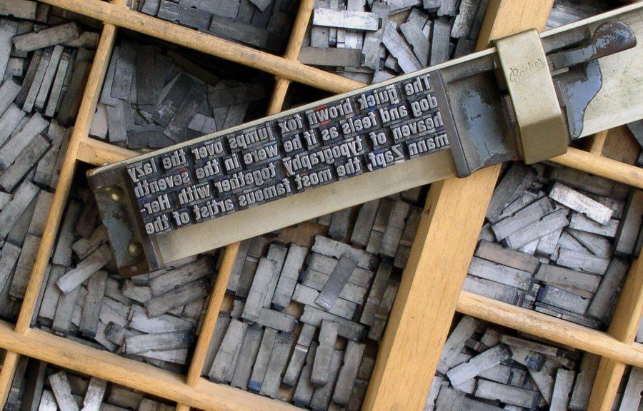 Movable type is locked into a composing stick. These are the tools of a bygone era as news media has moved on to faster methods of distributing the news of the day.