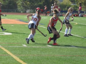 Junior Ali Cronin, 20, skirts around a Susquehanna Township player on the field hockey team’s October 8, 2015 game. Cronin will be student at Georgetown in the fall of 2017.