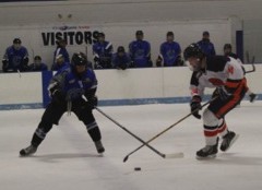 Sophomore, Sammy Steele, 24, carries the puck out of the Trojans defensive zone. Steele scored three out of five of the Trojan’s goals, on Wednesday, January 6th.