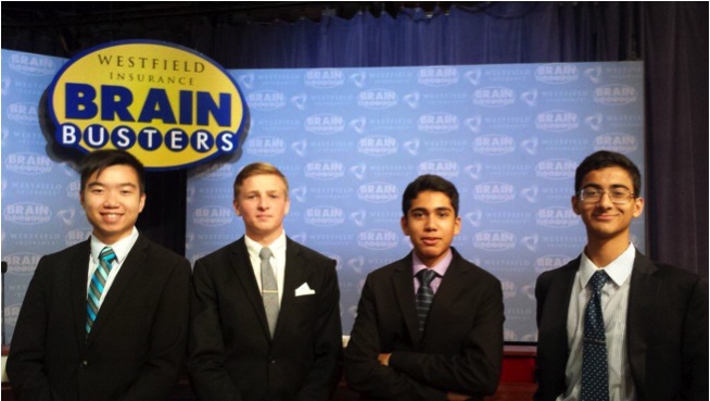 2)	Brain Buster competitors (from left to right) Jesse Cui, Brendan Twaddell, Samika Kanekar, and Omer Qureshi pose for the camera at the WGAL studio in the early fall. They have just won their first competition of the 2015-2016 school year. 