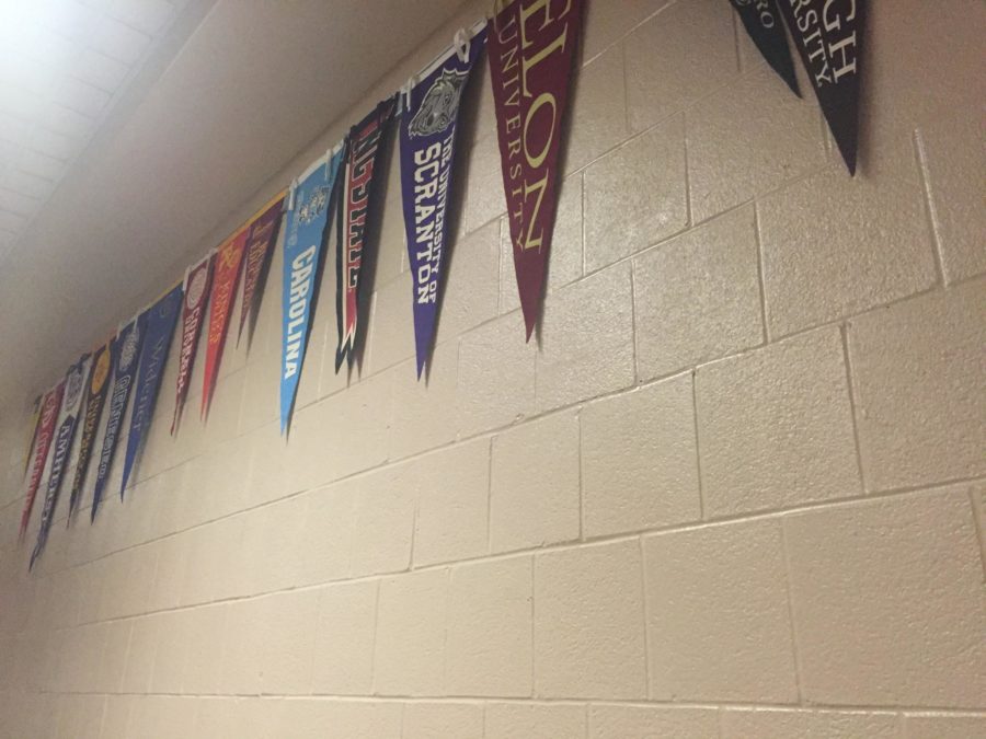 Hershey High School hangs up a multitude college flags in the hallway to give students ideas of different colleges to think about. HHS students have attended hundreds of different schools throughout the years. 