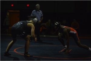 HHS Freshman Nyiem Flucas holds stance eyeing up East Pennsboro’s Dillon Stutter during his 160 lb match. Flucas won with a pin in the first period at 1 minute and 7 seconds. 