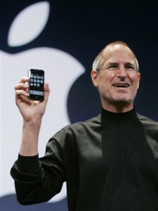 **FILE**Apple CEO Steve Jobs introduces the new Apple iPhone during his keynote address at MacWorld Conference & Expo in a San Francisco, Jan. 9, 2007. Apple announced on Monday, Sept. 10, 2007 that they sold its millionth iPhone. (AP Photo/Paul Sakuma, file)
