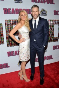 Actor Ryan Reynolds, right, and wife actress Blake Lively attend a special fan screening of "Deadpool" at the AMC Empire Times Square on Monday, Feb. 8, 2016, in New York. (Photo by Evan Agostini/Invision/AP)