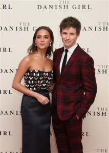 Alicia Vikander, left, and Eddie Redmayne pose for photographers upon arrival at the premiere of the film 'The Danish Girl' in London, Tuesday, Dec. 8, 2015. (Photo by Joel Ryan/Invision/AP)