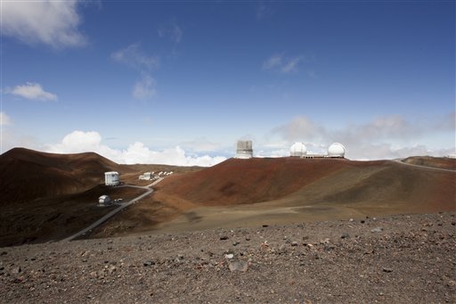 From bottom left, the Caltech Submillimeter Observatory, James Clerk Maxwell Telescope, the Submillimeter Array, the Subaru Telescope and the Keck Observatory telescopes are shown on Hawaiis Mauna Kea, Monday, Aug. 31, 2015, near Hilo, Hawaii. (AP Photo/Caleb Jones)