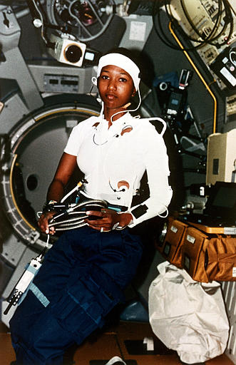Astronaut Mae C. Jemison is shown aboard Space Shuttle Endeavour as Science Mission Specialist on the STS-47 NASA Space lab-J flight, a US/Japan joint mission, in Sept. 1992.  As part of the Autogenic Feedback Tranining Experiment (AFTE), Dr. Jemison is wearing the headband and other monitoring gear at various times during the flight in support of physiological evaluations.  Dr. Jemison became the first black woman to orbit into space on Sept. 12.  (AP Photo/NASA)