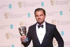 Actor Leonardo Di Caprio with his Best Actor award for his role in the film 'The Revenant' backstage at the BAFTA 2016 film awards at the Royal Opera House in London, Sunday, Feb. 14, 2016. (Photo by Joel Ryan/Invision/AP)