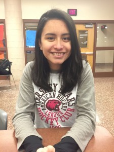 Nandy Loayza, a foreign exchange student from Bolivia and a senior at HHS, poses for a picture in the cafeteria. She applied to be a student here in March of 2015. 