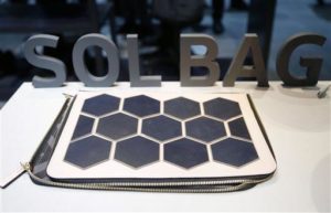 The Sol Bag solar power charger and handbag is on display at the Samsung booth during CES International, Friday, Jan. 8, 2016, in Las Vegas. (AP Photo/Gregory Bull) 