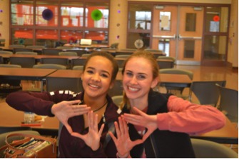 Azelin Thompson and Caroline Sinz pose for a photo on March 11, 2016. Thompson attended last year’s MiniTHON.  (Broadcaster/ Hannah Gundermann)