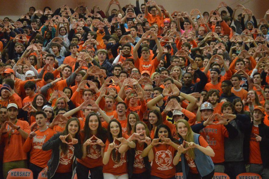 HHS Student section holds up a diamond symbol with the Mini THON chairs. (Broadcaster/ Kaylee Williams)