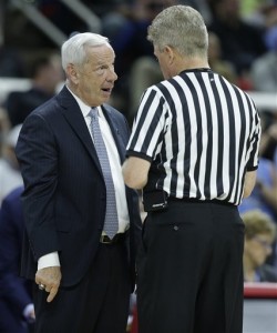 North Carolina head coach Roy Williams speaks to an official during the first half of a second-round men's college basketball game in the NCAA Tournament against Providence, Saturday, March 19, 2016, in Raleigh, N.C. (AP Photo/Chuck Burton)