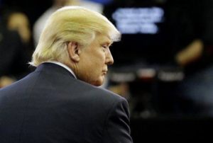 Republican presidential candidate, businessman Donald Trump pauses in the Spin Room after a Republican presidential primary debate at The University of Houston, Thursday, Feb. 25, 2016, in Houston. (AP Photo/David J. Phillip) 