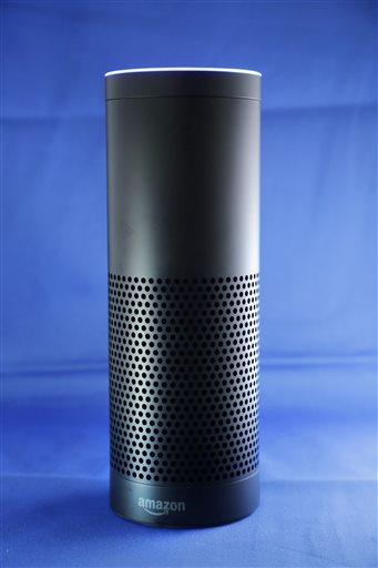 Amazons Echo, a digital assistant that can be set up in a home or office to listen for various requests, such as for a song, a sports score, the weather, or even a book to be read aloud, is shown, Wednesday, July 29, 2015 in New York. The $180 cylindrical device is the latest advance in voice-recognition technology thats enabling machines to record snippets of conversation that are analyzed and stored by companies promising to make their customers lives better. (AP Photo/Mark Lennihan)
