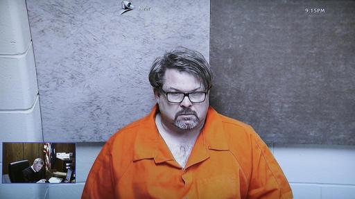  In this Feb. 22, 2016, file photo, Jason Dalton, of Kalamazoo Township, Mich., is arraigned via video before Judge Christopher T. Haenicke in Kalamazoo, Mich. Dalton is charged with multiple counts of murder in a series of random shootings in western Michigan. The killings in Kalamazoo, Michigan, raised anew a question that has dogged Uber and other taxi competitors. Their rides may be cheaper and more conveniently hailed than a cab, but the question is are they as safe. (AP Photo/Carlos Osorio, File)