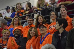 Hershey boys swim team parents support their sons at the district III meet. Mike Kushner (bottom left in orange hat) arrived at Cumberland Valley High School at around 3:00 p.m. to make sure he got a good seat to watch his son compete. (Broadcaster/Kieran Holley)