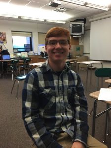 Colin Topper poses after a lengthy debate with a fellow Speech and Debate club member on Friday, April 29th, 2016. Topper has been in the club since his freshman year. (Broadcaster/ Irene Ciocirlan)