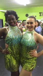 HHS senior Colette Robinson and junior Erin Wolfe pose in their tap costumes on Sunday, April 24, 2016. Robinson and Wolfe are dancers at McCann’s School of Dance. (Submitted/ Erin Wolfe)