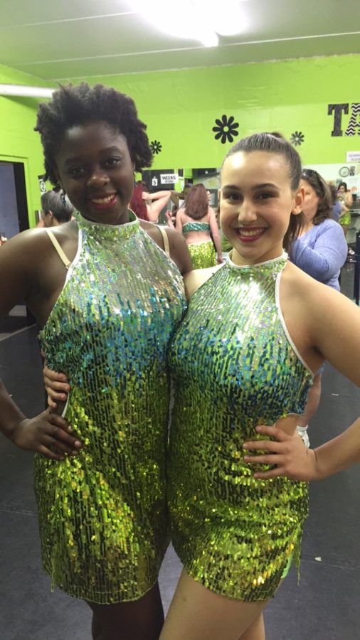 HHS senior Colette Robinson and junior Erin Wolfe pose in their tap costumes on Sunday, April 24, 2016. Robinson and Wolfe are dancers at McCann’s School of Dance. (Submitted/ Erin Wolfe)