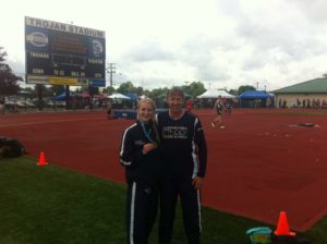 Cotton and Coach Kevin Stover pose after a meet. Caroline said Coach Stover has been a big influence on the athlete she is today. Picture submitted by: Caroline Cotton 