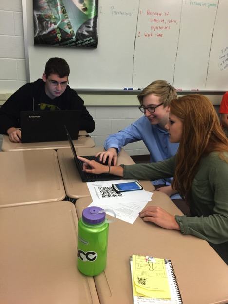 From left to right: Junior Colin Sheehan, Junior David Sheffey, and Sophomore Grace Murray prepare for their next session on Friday, April 29th, 2016. Their first student-run session was a success. (Broadcaster/ Irene Ciocirlan)