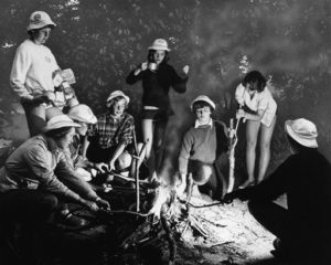 Cool evening; a crackling fire and a snack add zest to the end of a day's camp activities March 10 1962 (AP Photo)
