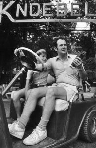 Ron Knoebel and his 10-year-old daughter Stacey make the rounds in a golf cart at family run amusement resort in Elysburg, Pa., July 10, 1983. Ron, who has worked in the park since he was 6, is co-manager of the park with his brother Dick and is one of 24 family members on the payroll. (AP Photo/Rusty Kennedy)