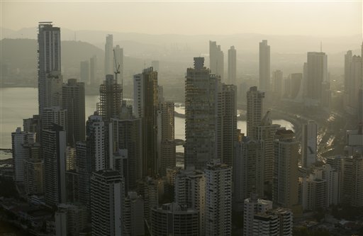 Panama City skyline is seen at sunset in Panama, Monday, April 4, 2016. Panamas president says his government will cooperate vigorously with any judicial investigation arising from the leak of a vast trove of information on the offshore financial dealings of the worlds rich and famous. An international coalition of media outlets Sunday published investigations it said stemmed from the leak of 115 million records kept by the Panama-based law firm Mossack Fonseca on behalf of clients. (AP Photo/Arnulfo Franco)