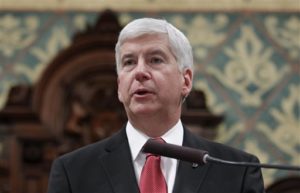 Michigan Gov. Rick Snyder delivers his State of the State address to a joint session of the House and Senate, at the state Capitol in Lansing, Mich. Snyder has released some, but not all, of his government emails related to Flints water emergency. The 274 pages cover 2014 and 2015. That includes the 18-month period during which the city switched its water source while under state financial management until it reconnected to Detroits system because of lead contamination blamed on state regulatory failures. Snyder has withheld the emails of others in the executive office along with his own emails from earlier. (AP Photo/Al Goldis, File)