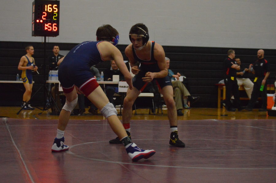 Sophomore Joshua Chancey takes a ready stance during the Sectional Tournament on February 20,2016.  Chancey lost with a pin at 1 minute, 37 seconds. (Broadcaster/Williams)