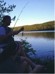 Kieran Holley and her dad fish at Little Buffalo State Park during the summer of 2013. “Fishing and racing were his favorite things for Father’s Day,” said Holley. (Submitted/ Kieran Holley) 
