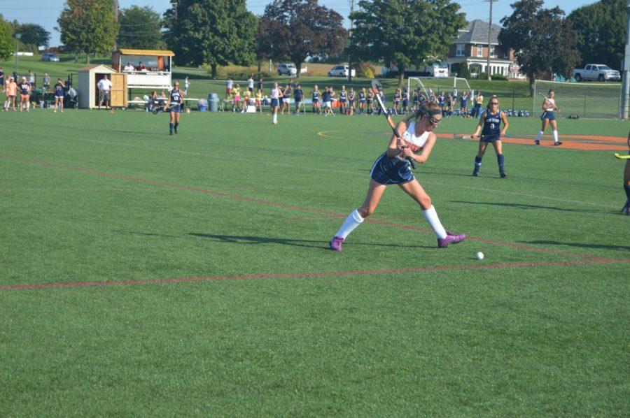 Hershey senior Jacquiline Foley (above) winds up for a drive upfield in the first period. The Trojans went on to lose 3-0 to Penn Manor. (Broadcaster/Haley Daniels)
