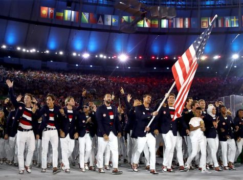 Olympic medalist Michael Phelps leads Team USA at the opening ceremonies on Friday, August 5, 2016 in Rio De Janeiro. Team USA filed out with almost 600 athletes. (Photo Courtesy/E! News) 