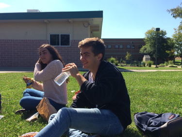 Theo Nunes, center, enjoys lunch with friends on Tuesday, September 27, 2016. Nunes came to HHS from France for the 2016-17 school year. (Broadcaster/Camille Heck) 