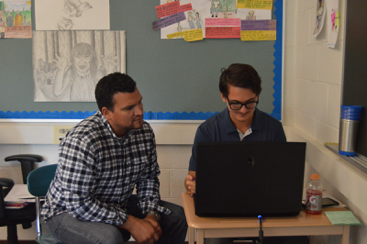 Mr. Ortiz and Mr. LeHan share ideas about next week's lessons on September 19, 2016 at HHS. LeHan has been teaching Ortiz’s American History class. (Broadcaster/Emerson Freer)