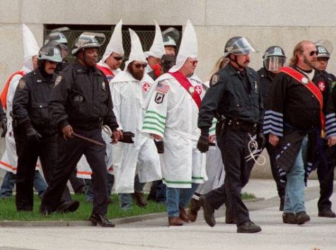 In this May 29, 2004 file photo, Former Ku Klux Klan leader David Duke speaks to supporters in Kenner, La. Duke says he may run for Congress against the No. 3 House Republican, Steve Scalise of Louisiana. Scalise recently apologized for a speech he gave in 2002 to a white supremacist group founded by Duke. (AP Photo/Burt Steel, File)