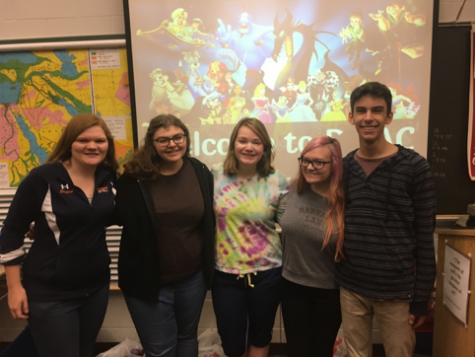 (From left to right) Student advisors Elizabeth McCurdy, Kellie Drobenak, Kimberly Robinson, Maddy Soulliard, and Thomas Perry setup for Community Day on October 7, 2016. These students have been the advisors for the last two years. (Broadcaster/ Anna Levin)