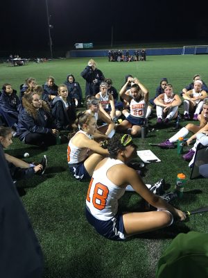 Hershey field hockey team sits at half time discussing the first half of the Hershey vs Palmyra game. Hershey later scored two goals against Palmyra, winning 2-0 on Thursday September 29, 2016. (Broadcaster/Carly Carrasco) 