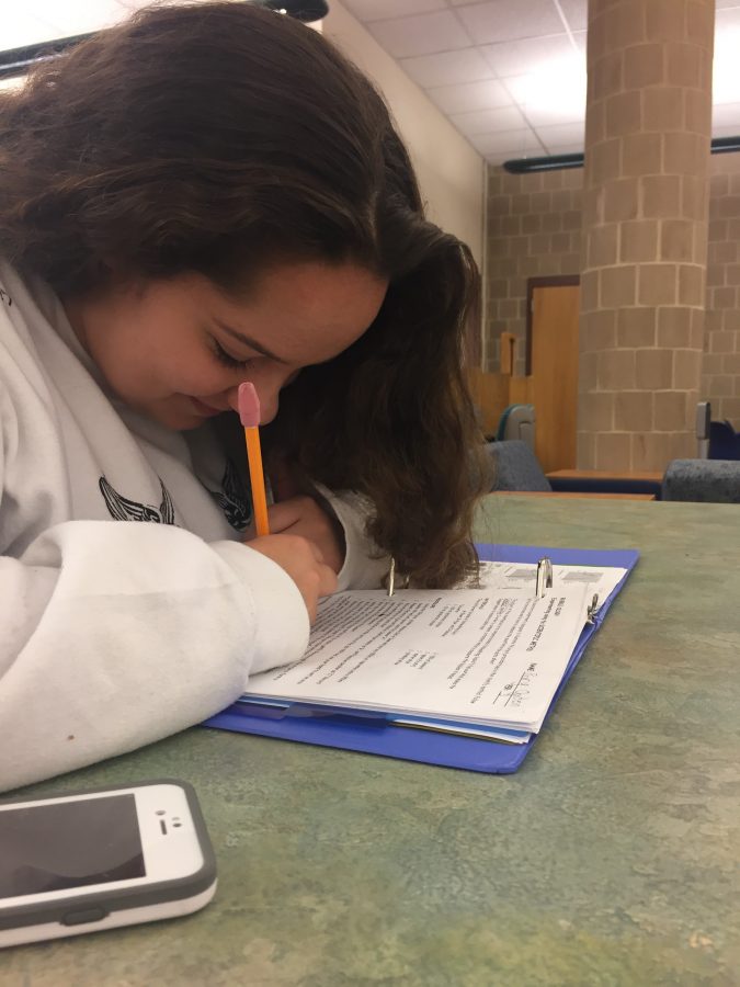 HHS freshman Rory Ogden works on her biology homework on October 12, 2016. Ogden was not traveling due to acting, so she was able to attend school instead of learning through HOLA. (Broadcaster/Elizabeth Newman). 