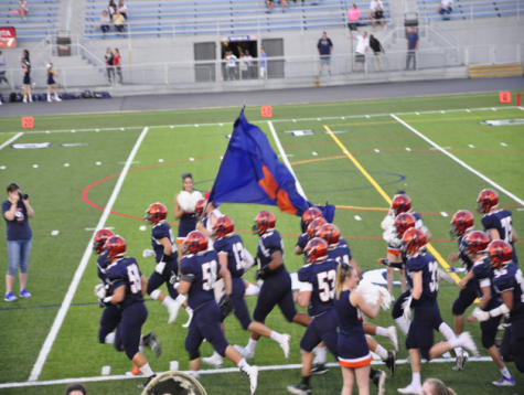 On Friday, September 23, 2016, the Hershey High School football team runs onto the field to celebrate the game beginning. (Broadcaster/ Abby Shapiro) 