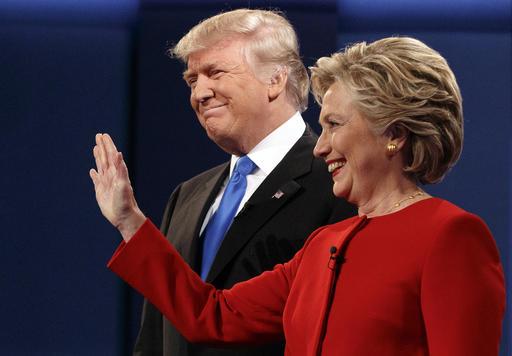 Republican presidential candidate Donald Trump, left, stands with Democratic presidential candidate HillaryClinton at the first presidential debate at Hofstra University, Monday, Sept. 26, 2016, in Hempstead, N.Y. (AP Photo/ Evan Vucci)
